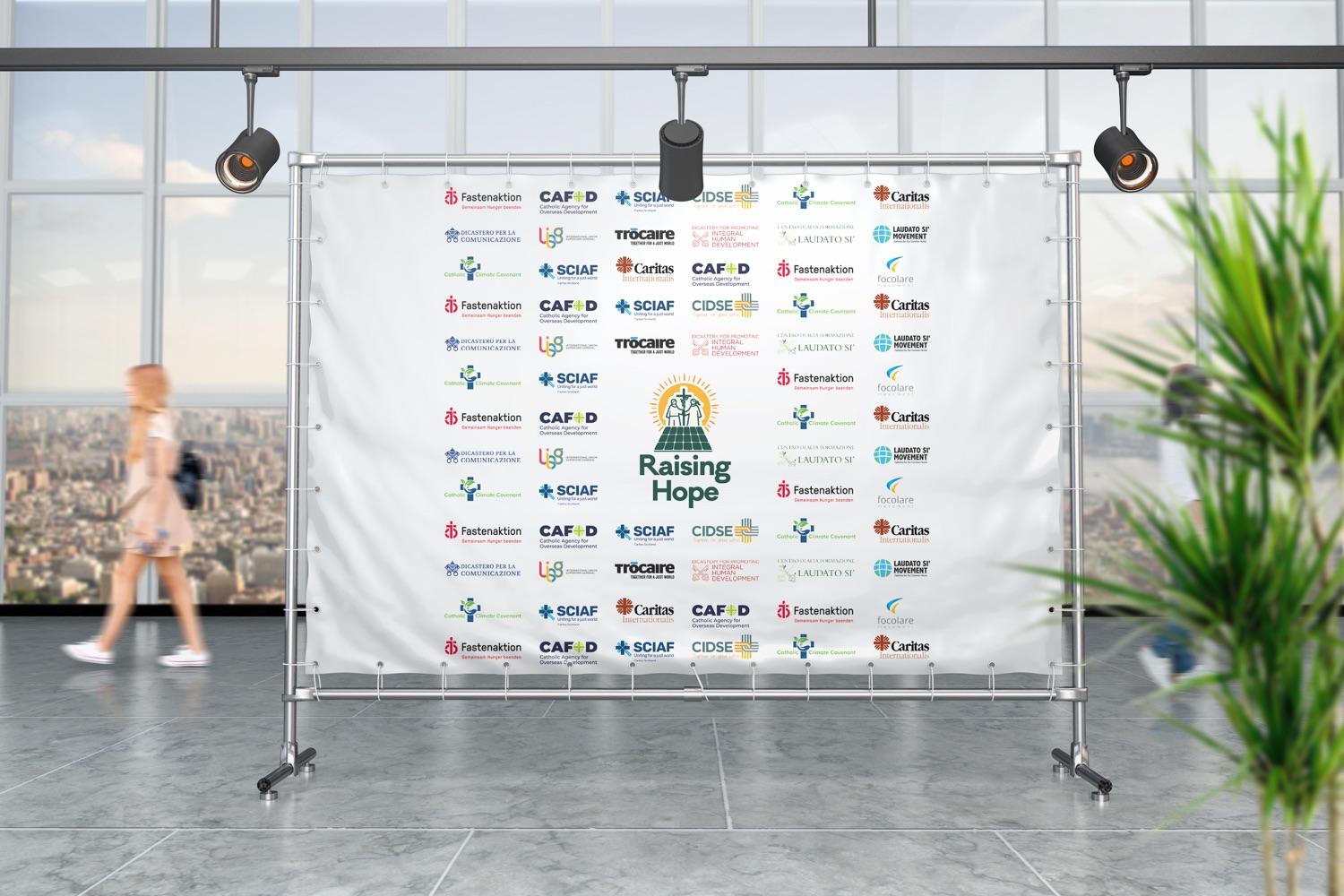 Photocall oficial — el logo entre los de dos dicasterios vaticanos y las agencias socias