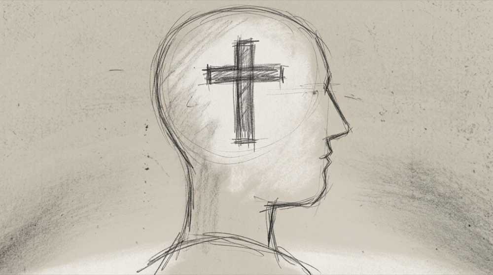 Hand-drawn sketch of a cross within a head silhouette